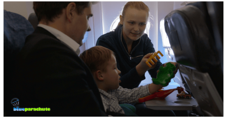 A man and a woman are sitting in a plan with a young child between them. They appear to be trying to keep the child entertained. This helps illustrate flying with autism and that there are some tips to have a smooth, safe journey.