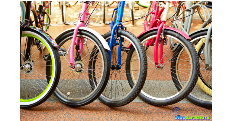 A row of colorful bicycles are lined up next to each other near a sidewalk. This implies that the piece is about adaptive bikes for autism.