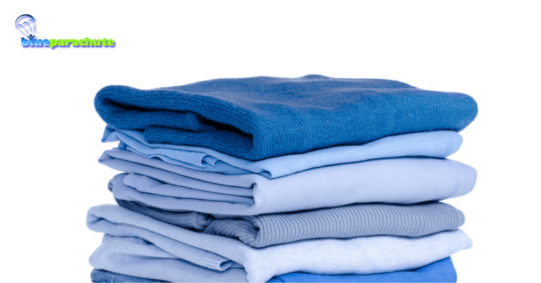 A stack of blue clothes indicates that this piece is about autism and clothes.